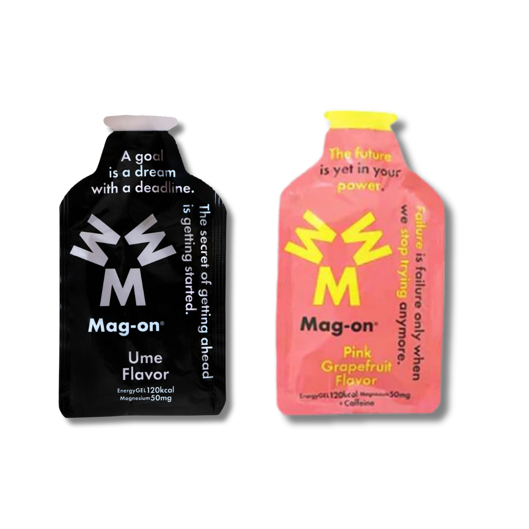product shot of two packets of Mag-on energy gel in black and pink
