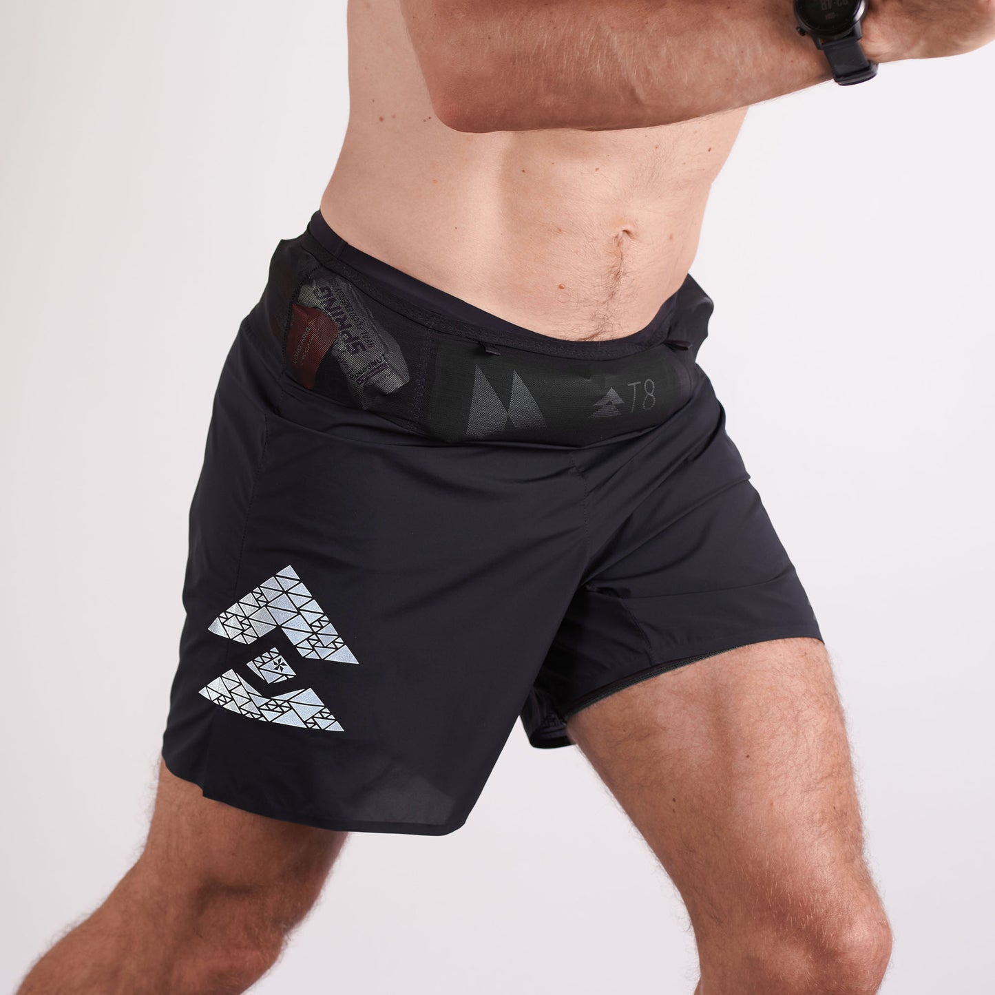 Mens02_e087a601-a465-T8-black-V2-Sherpa-shorts-Mens-available-at-red-dot-running-company-worn-front-lifestyle