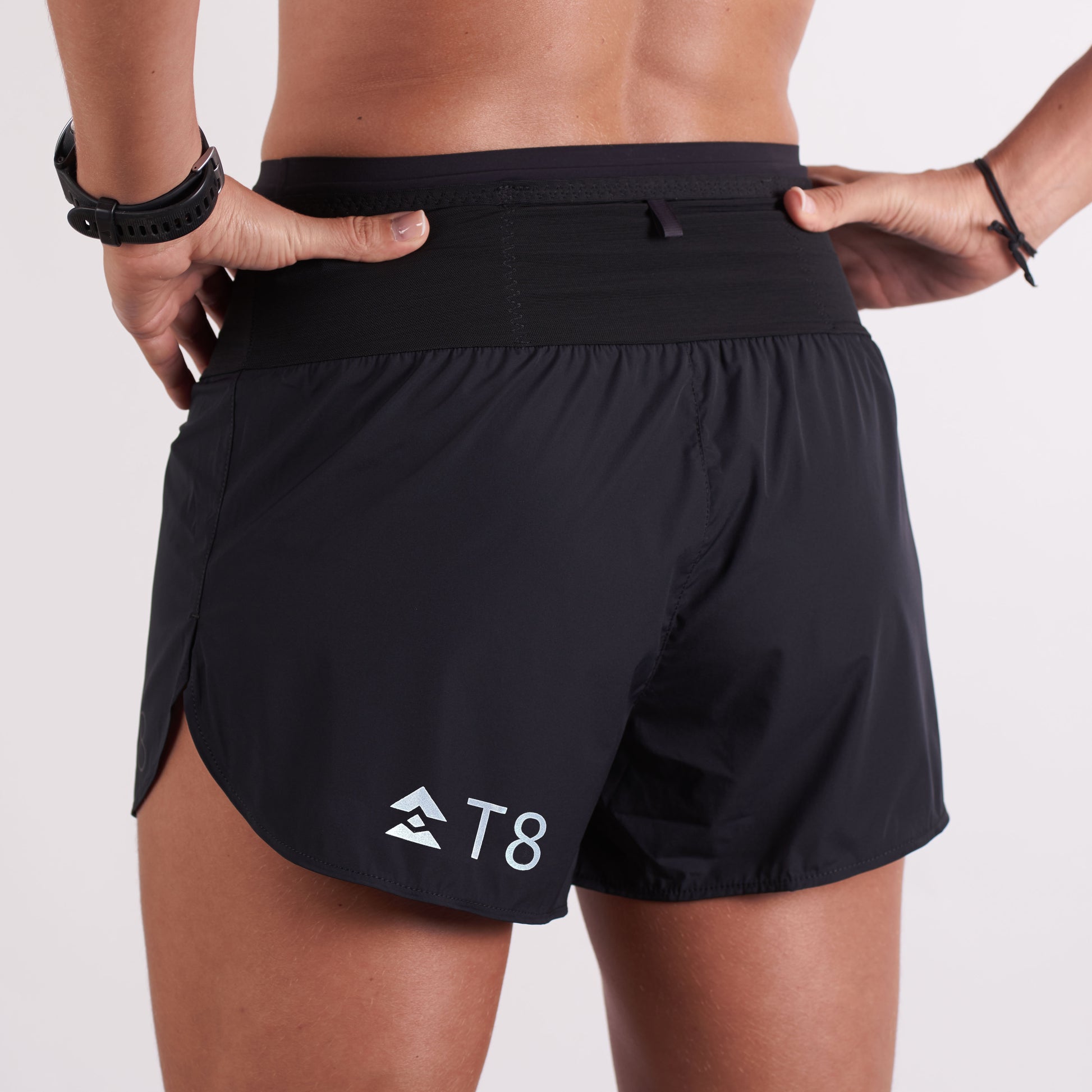 T8-Sherpa-Shorts-V2-Black-womens-available-at-red-dot-running-company-lifestyle-back-view seen worn on a female